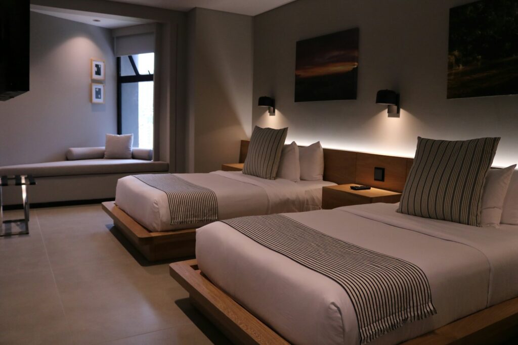 Twin guest room with lounge seating