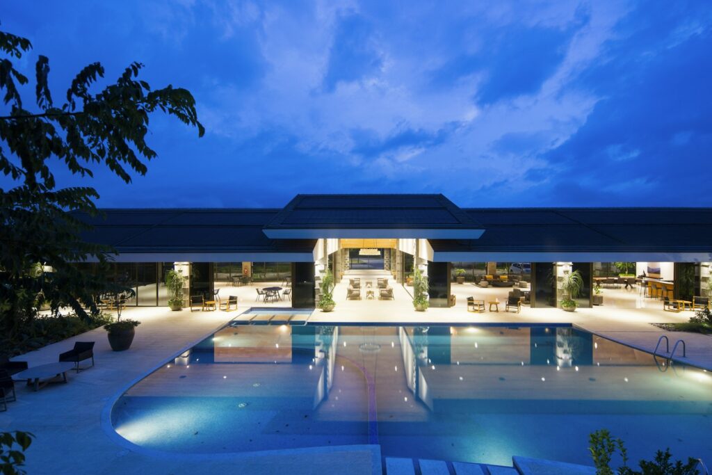 Illuminated pool terrace at night