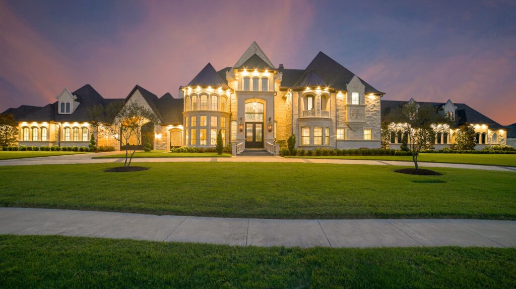 Bungalow exterior lit at dusk